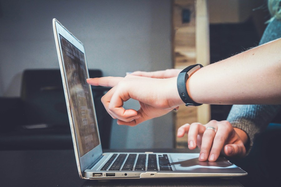 Digital team coordinating a customer journey on a laptop